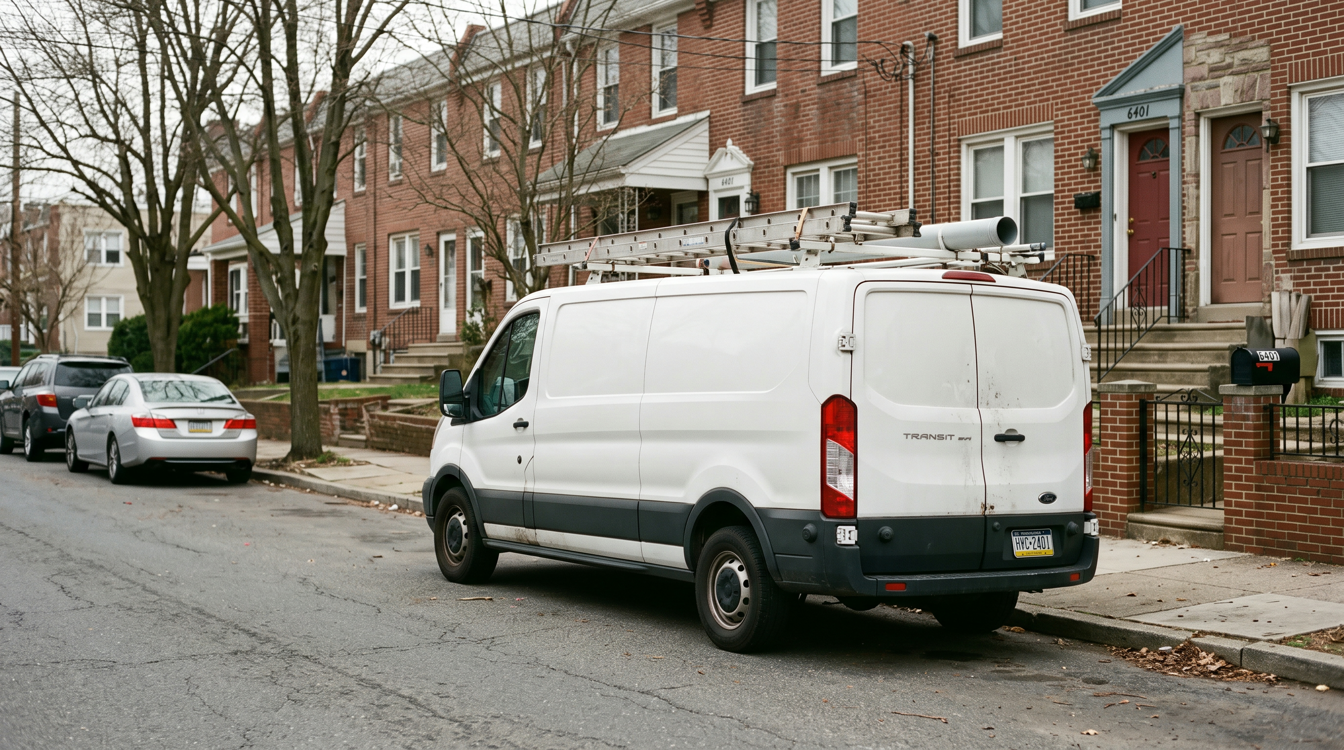 Work van parked on a Philadelphia row-home street